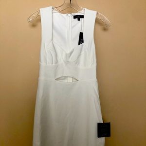 Lulu’s peak-a-boo white mini dress. Never worn!